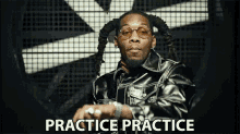 Gif of a rapper saying practice makes perfect