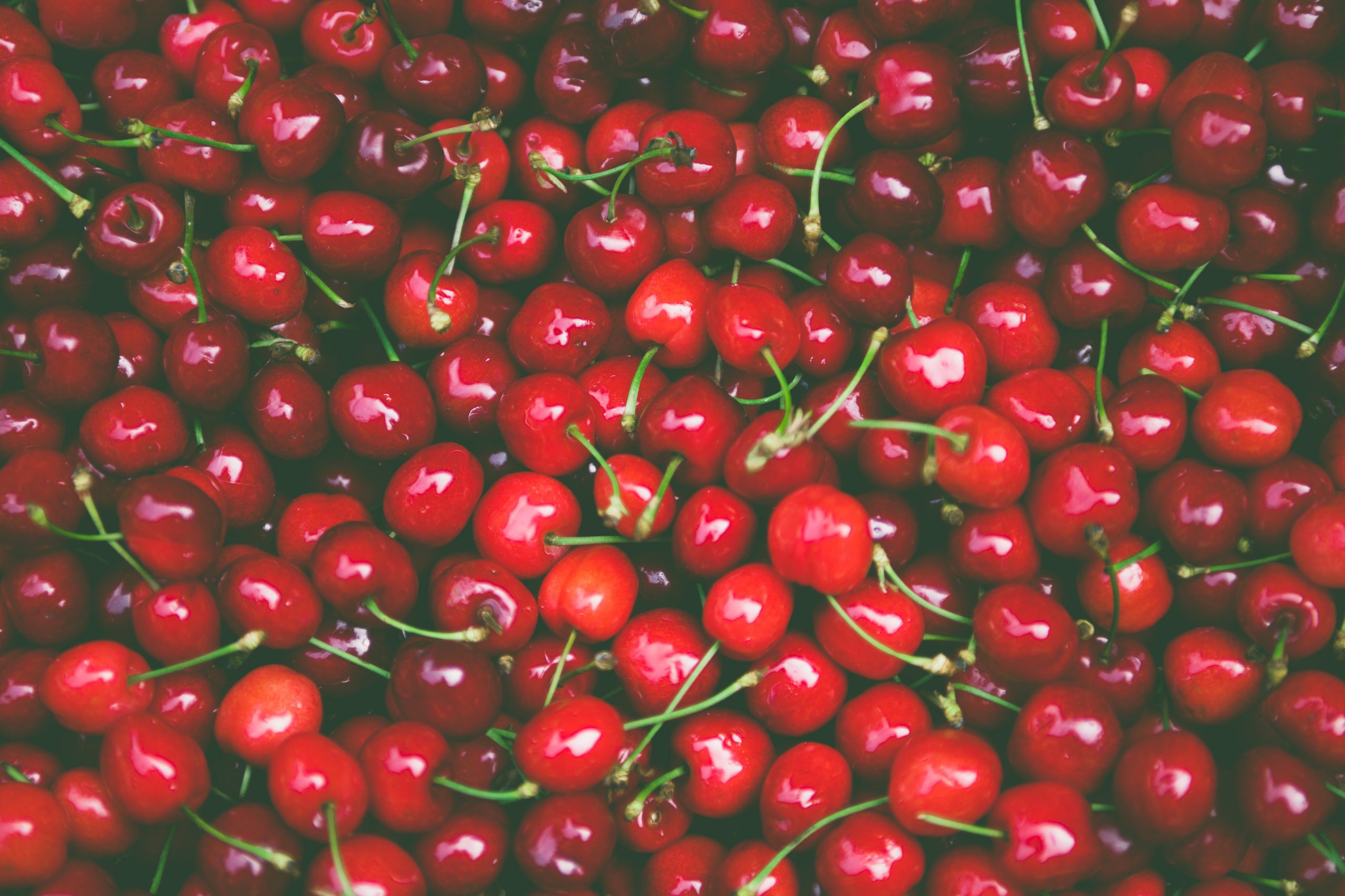Pile of bright red cherries