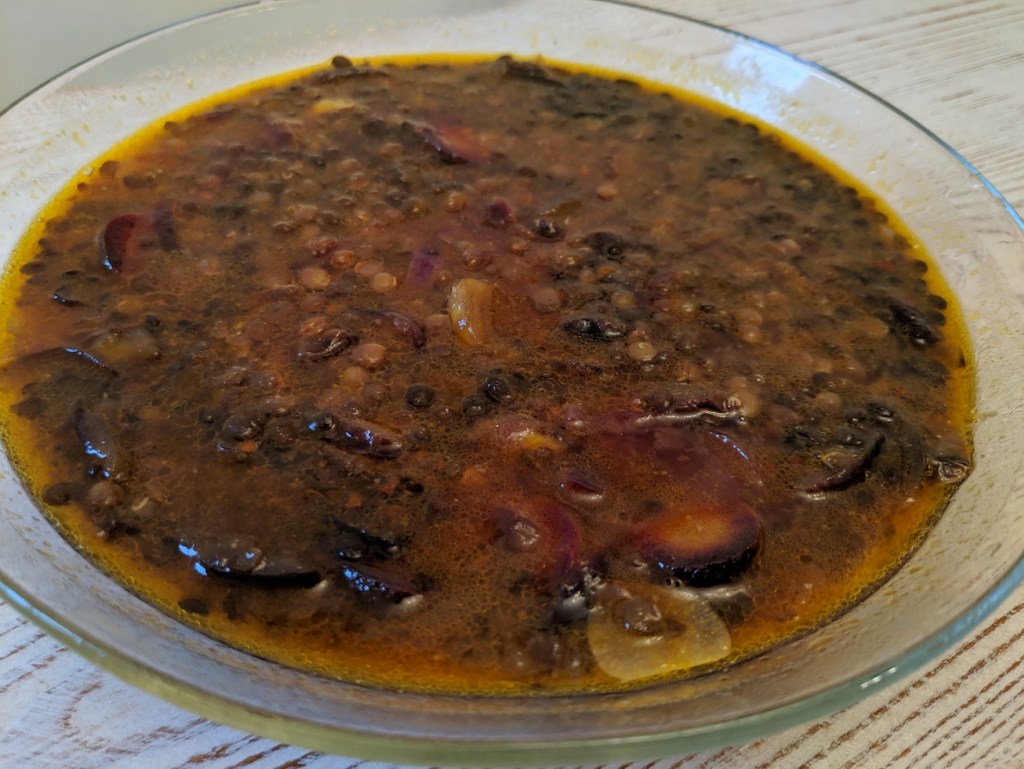 Bowl of lentil soup with nutmeg in it